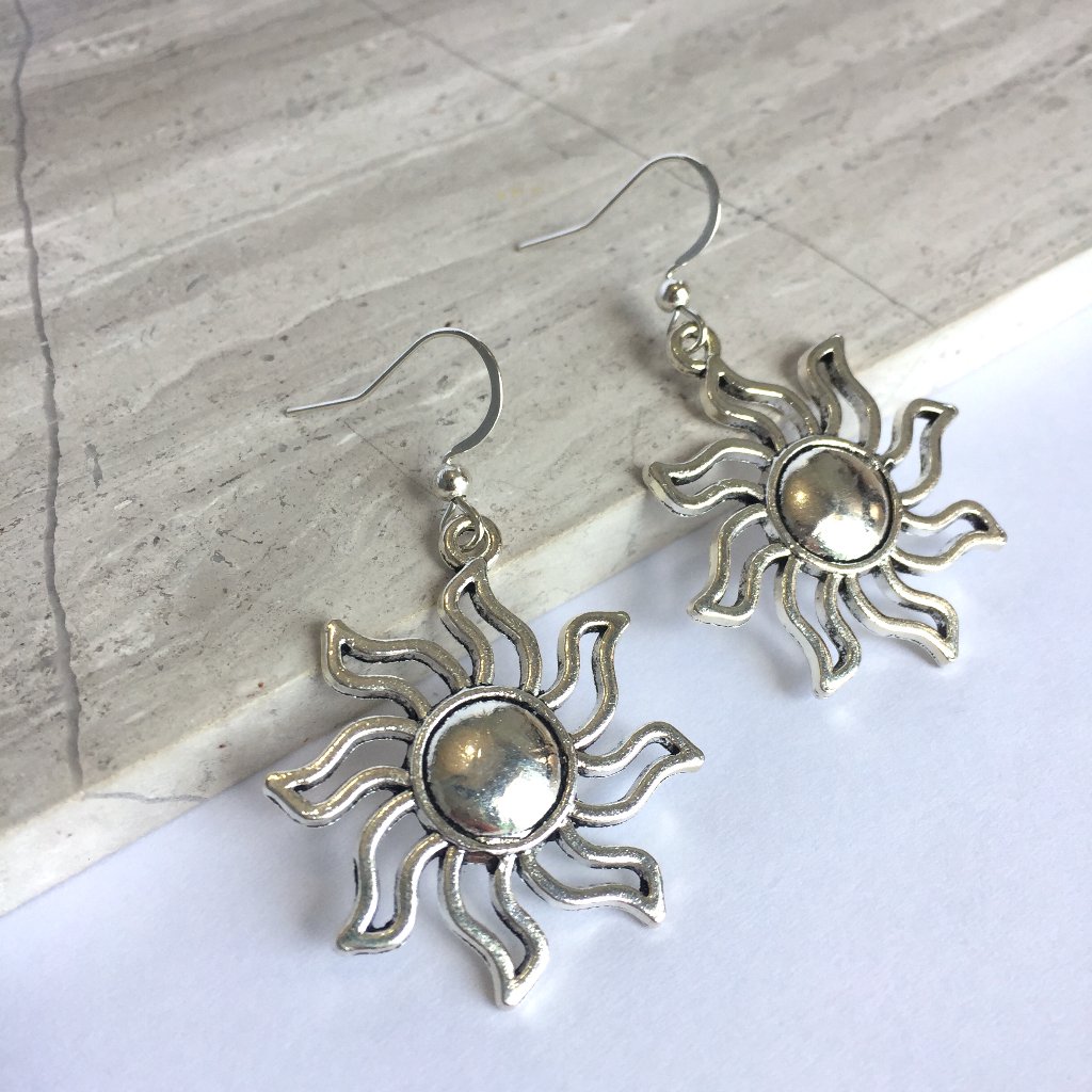 Silver Sunburst Earrings 25$